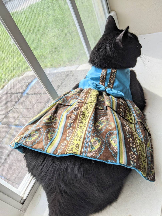 Elegant Cat Dress with Brown Details